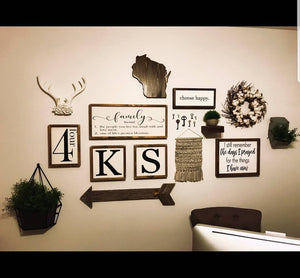 Gallery wall featuring some of our most popular handmade wood signs