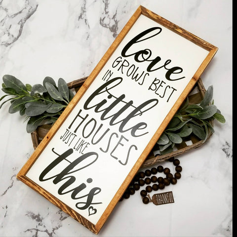 Love grows best in little houses sign