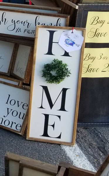 Home sign with wreath