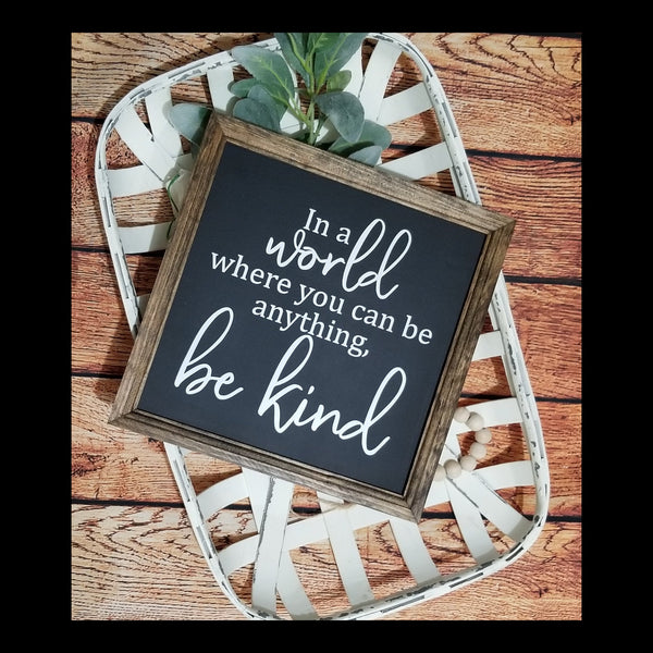 In a world where you can be anything be kind sign